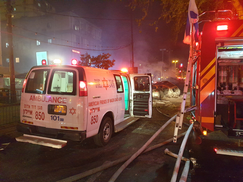An ambulance treats Israelis injured in terror attack