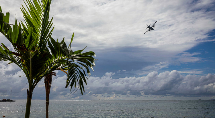 A Royal Australian Air Force C-27J aircraft performs a flypast near the waterfront at Apia, during Operation Solania 23-2 A Royal Australian Air Force C-27J aircraft performs a flypast near the waterfront at Apia, during Operation Solania 23-2