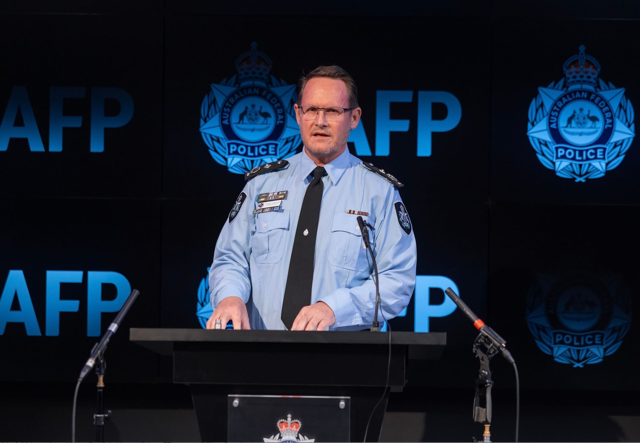 AFP Op Autumn Shield Aug25 AFP arrest Chinese nation al on foreign interference charges.